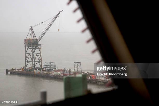 Crane is seen from the bridge of the USS Gerald R. Ford aircraft carrier during outfitting and testing at Huntington Ingalls Industries' Newport News...