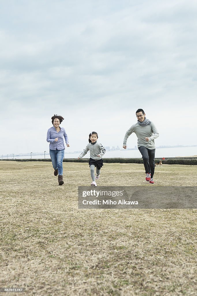 Japanese family at a park.