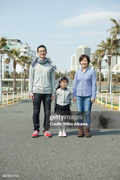 japanese family at a park. - 3 men standing outside stock pictures, royalty-free photos & images