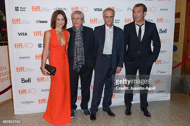 Actress Elsa Zylberstein, director/writer Claude LeLouch, actor Christopher Lambert and actor Jean Dujardin attend the premiere of 'Un Plus Une' at...