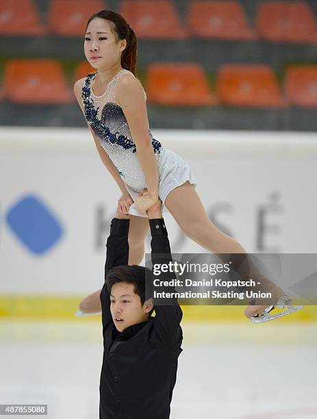 Ye Ri Kim and Alex Kang Chan Kam of Korea skate during the junior pairs free skating on day three of the ISU Junior Grand Prix of figure skating on...