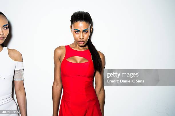 Models prepare backstage during the Chromat featuring Intel Collaboration dress rehearsal at Milk Studios on September 11, 2015 in New York City.