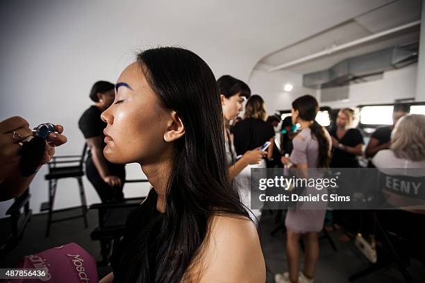 Model has make up applied backstage during the Chromat featuring Intel Collaboration show at Milk Studios on September 11, 2015 in New York City.