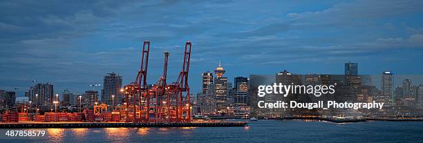 industrial loading cranes in the port of vancouver, canada - vancouver harbour stock pictures, royalty-free photos & images