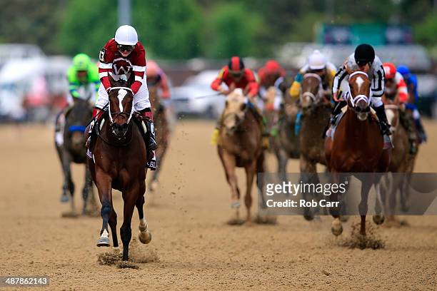 Untapable, ridden by Rosie Napravnik, leads the field to the finish line to win the 140th running of the Kentucky Oaks at Churchill Downs on May 2,...