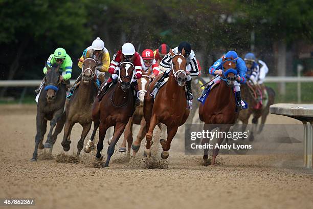 Untapable, ridden by Rosie Napravnik, and My Miss Sophia, ridden by Javier Castellano, lead the field during the 140th running of the Kentucky Oaks...