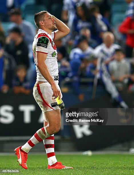 Dejected Dragons five eight Gareth Widdop leaves the field after his teams loss at the NRL Elimination Final match between the Canterbury Bulldogs...