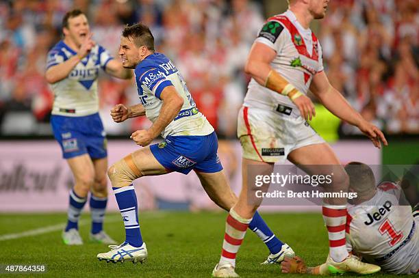 Josh Reynolds of the Bulldogs celebrates kicking a field goal to win the match during the NRL Elimination Final match between the Canterbury Bulldogs...