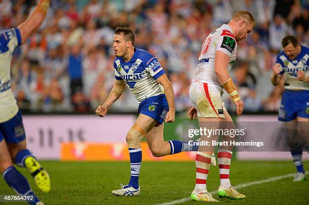 Josh Reynolds of the Bulldogs celebrates kicking a field goal to win the match during the NRL Elimination Final match between the Canterbury Bulldogs...