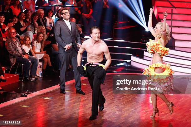 Moderator Daniel Hartwich, Isabel Edvardsson and Alexander Klaws seen on stage during the 5th show of 'Let's Dance' on RTL at Coloneum on May 2, 2014...