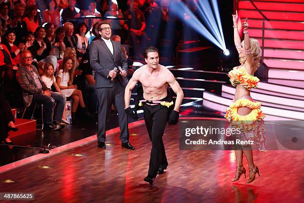 Moderator Daniel Hartwich, Isabel Edvardsson and Alexander Klaws seen on stage during the 5th show of 'Let's Dance' on RTL at Coloneum on May 2, 2014...