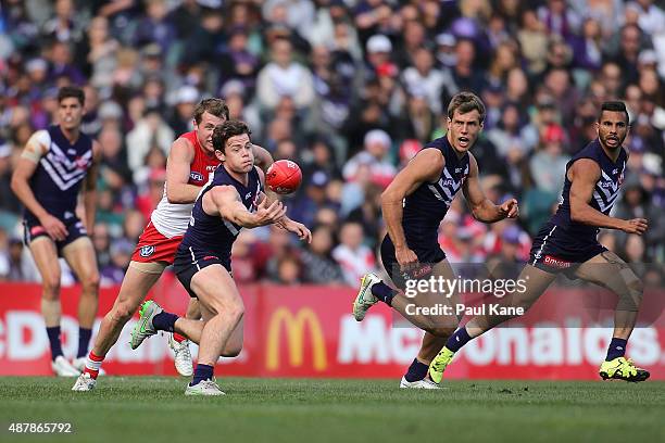 Lachie Neale of the Dockers gathers the ball during the First AFL Qualifying Final match between the Fremantle Dockers and the Sydney Swans at Domain...