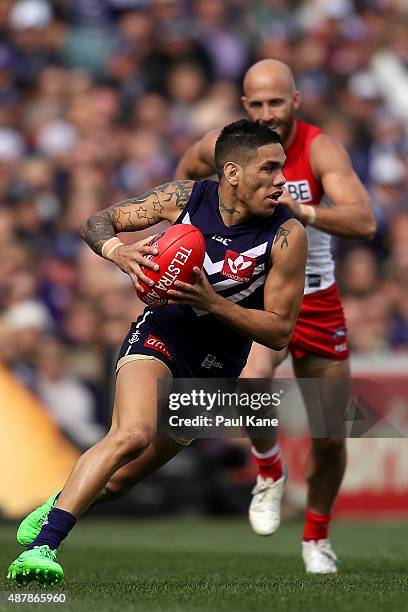 Michael Walters of the Dockers breaks clear of Jarrad McVeigh of the Swans during the First AFL Qualifying Final match between the Fremantle Dockers...