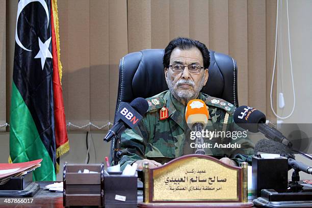 Libyan commander Salim al-Ubeyde speaks in a press conference after a clash happened between security forces and Ansar al-Sharia members in Benghazi,...