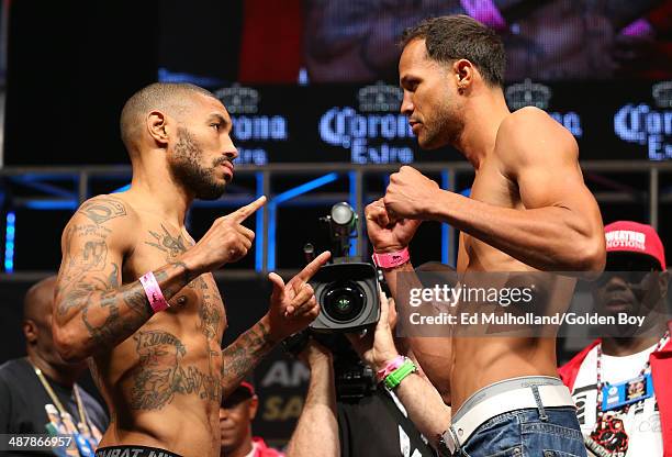 Ashley Theophane and Angino Perez face off after weighing in for their welterweight fight at the MGM Grand Garden Arena on May 2, 2014 in Las Vegas,...