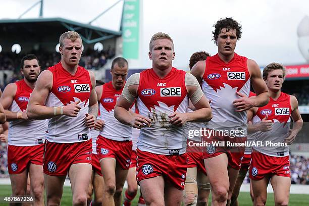 Dan Hannebery leads the Swans off the field at the break during the First AFL Qualifying Final match between the Fremantle Dockers and the Sydney...