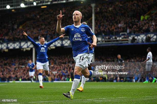 Steven Naismith of Everton celebrates scoring the opening goal during the Barclays Premier League match between Everton and Chelsea at Goodison Park...