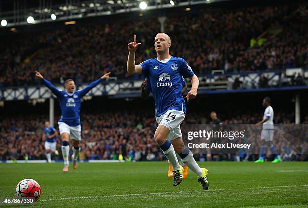 Steven Naismith of Everton celebrates scoring the opening goal during the Barclays Premier League match between Everton and Chelsea at Goodison Park...