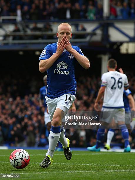 Steven Naismith of Everton celebrates scoring the opening goal during the Barclays Premier League match between Everton and Chelsea at Goodison Park...