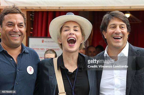 Claudio Tesauro, Sharon Stone and Dario Roustayand Visit Expo 2015 on September 12, 2015 in Milan, Italy.