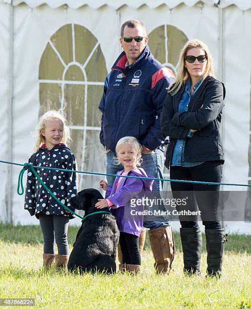 Autumn Phillips and Peter Phillips with Savannah Phillips and Isla Phillips attend the Whatley Manor International Horse Trials at Gatcombe Park on...