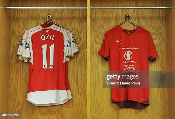 Save the Children Warm Up tops in the changingroom before the Barclays Premier League match between Arsenal and Stoke City on September 12, 2015 in...