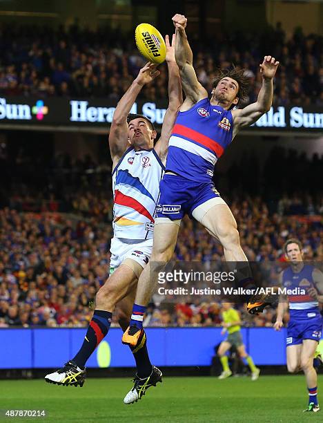Taylor Walker of the Crows and Easton Wood of the Bulldogs contest the ball during the 2015 AFL Second Elimination Final match between the Western...