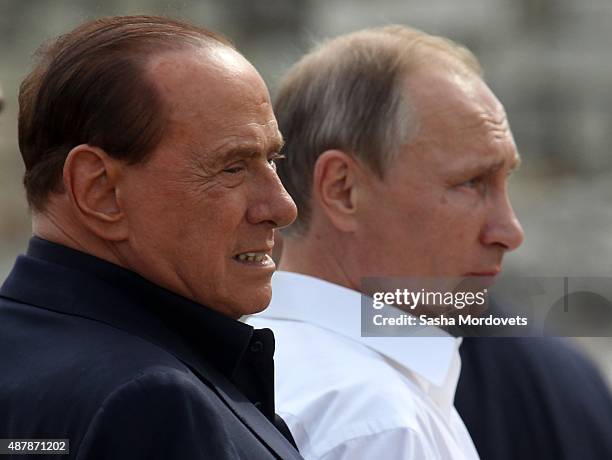 Russian President Vladimir Putin and Former Italian Prime Minister Silvio Berlusconi are seen during joint visit to Chersonesus museum in on...