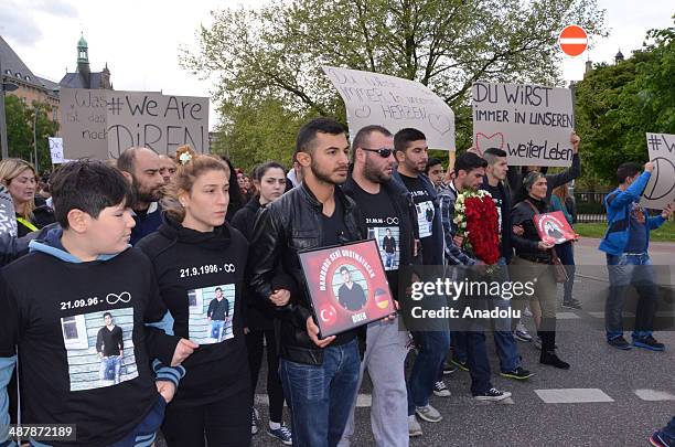 Nearly 600 people attend the march held by friends of Diren to commemorate him, in Hamburg, Germany on May 2, 2014.