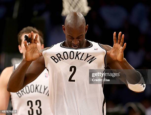 Kevin Garnett of the Brooklyn Nets celebrates in the second half against the Toronto Raptors in Game Six of the Eastern Conference Quarterfinals...