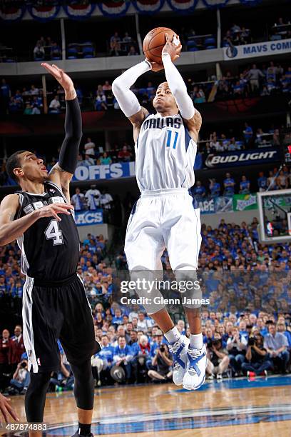 Monta Ellis of the Dallas Mavericks shoots a jumper against Danny Green of the San Antonio Spurs in Game Six of the Western Conference Quarterfinals...