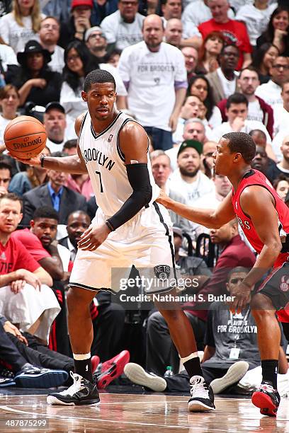 Joe Johnson of the Brooklyn Nets dribbles the ball against the Toronto Raptors during Game Six of the Eastern Conference Quarterfinals at Barclays...