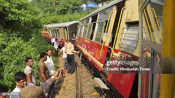 View of the derailed Kalka-Shimla train near Parwanoo on September 12, 2015 in Himachal Pradesh, India. Two persons have been killed and eight others...