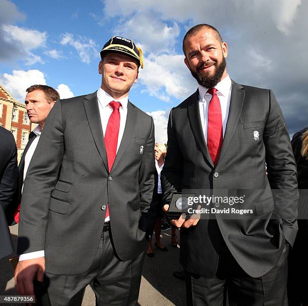 Owen Farrell and his father Andy Farrell, backs coach of the England 2015 World Cup Rugby squad pose at Sandhurst Millitary College for their...