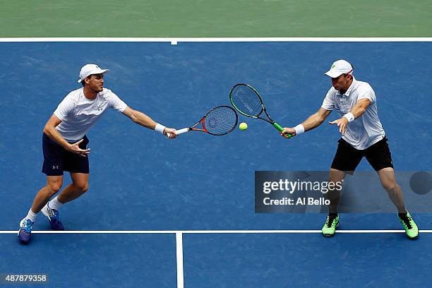 Jamie Murray of Great Britain and John Peers of Australia return a shot to Pierre-Hugues Herbert and Nicolas Mahut of France during their Men's...