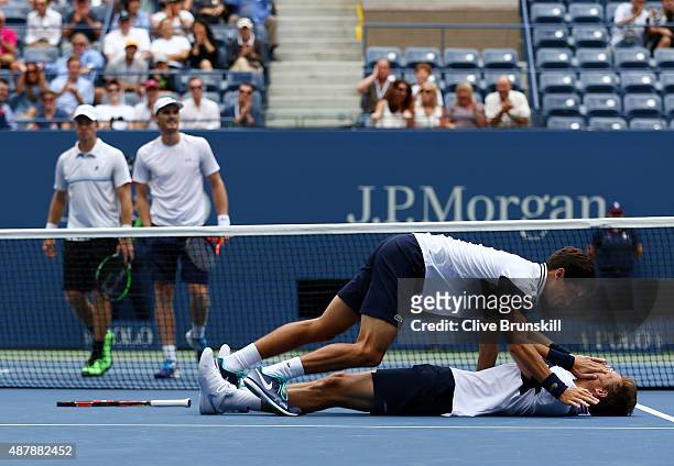 Pierre-Hugues Herbert and Nicolas Mahut of France celebrate after defeating Jamie Murray of Great Britain and John Peers of Australia during their...