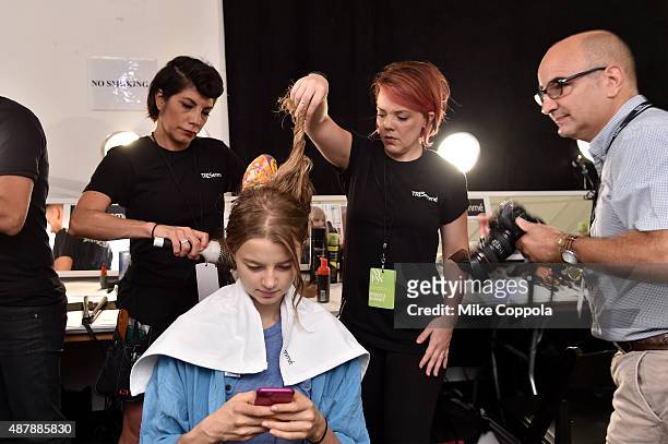 Model prepares backstage with TRESemme at the Rebecca Minkoff Runway Show SS 16 at The Gallery, Skylight at Clarkson Sq on September 12, 2015 in New...