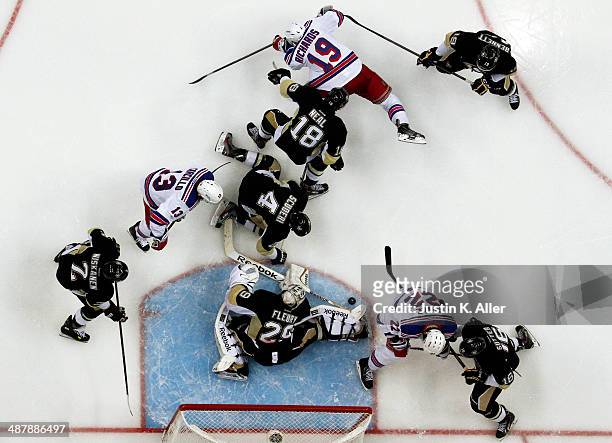 Marc-Andre Fleury of the Pittsburgh Penguins makes a save against the New York Rangers in Game One of the Second Round of the 2014 NHL Stanley Cup...