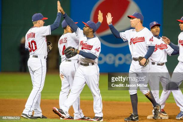Elliot Johnson Mike Aviles Michael Bourn and David Murphy of the Cleveland Indians celebrate after the Indians defeated the Chicago White Sox at...