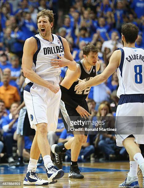 Dirk Nowitzki of the Dallas Mavericks celebrates during play against the San Antonio Spurs in Game Six of the Western Conference Quarterfinals during...