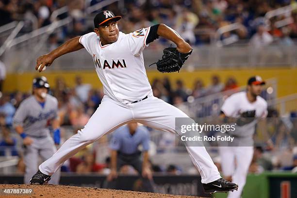 Carlos Marmol of the Miami Marlins delivers a pitch during the eighth inning of the game Los Angeles Dodgers at Marlins Park on May 02, 2014 in...