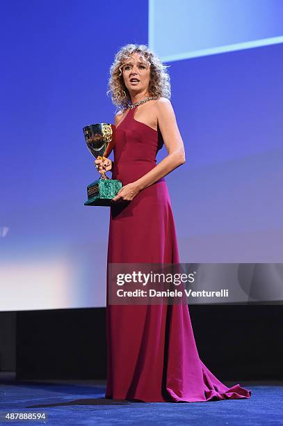 Actress Valeria Golino on stage with the Coppa Volpi for best Actress Award for the movie 'Per Amore Vostro' at the closing ceremony during the 72nd...