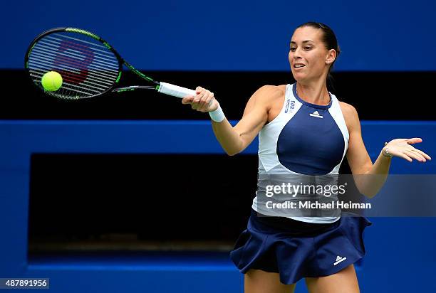 Flavia Pennetta of Italy returns a forehand shot to Roberta Vinci of Italy during their Women's Singles Final match on Day Thirteen of the 2015 US...