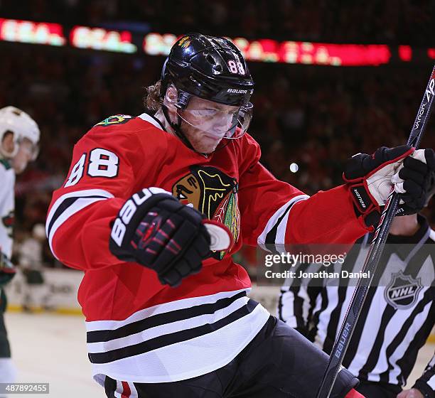 Patrick Kane of the Chicago Blackhawks celebrates the first of his third period goals against the Minnesota Wild in Game One of the Second Round of...