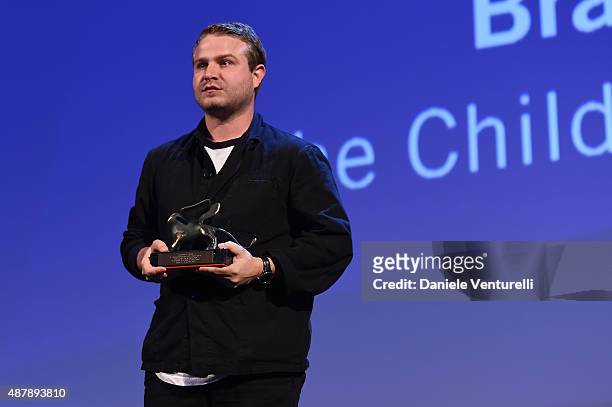 Brady Corbet with the Orizzonti Award for Best Director for 'The Childhood of a Leader' on stage at the closing ceremony during the 72nd Venice Film...