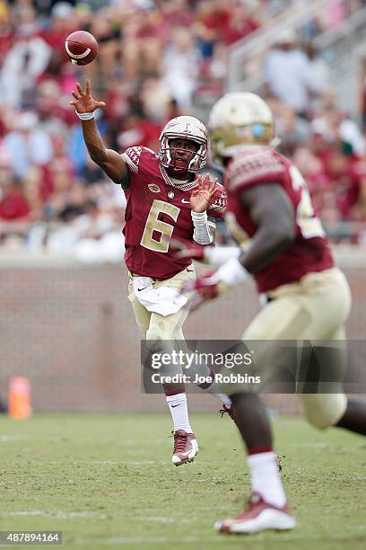 Everett Golson of the Florida State Seminoles passes against the South Florida Bulls during a game at Doak Campbell Stadium on September 12, 2015 in...