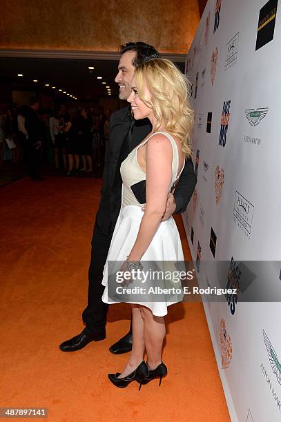 Actors Johnathon Schaech and Julie Solomon attend the 21st annual Race to Erase MS at the Hyatt Regency Century Plaza on May 2, 2014 in Century City,...