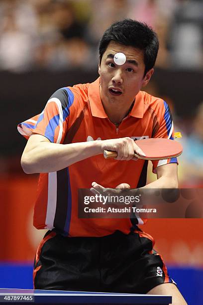 Saehyuk Joo of South Korea serves against Chien-An Chen of Chinese Taipei during day six of the 2014 World Team Table Tennis Championships at Yoyogi...