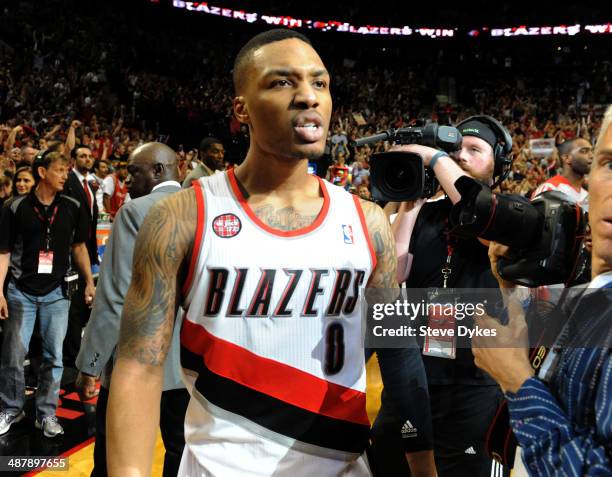 Damian Lillard of the Portland Trail Blazers celebrates after hitting the game winning shot in Game Six of the Western Conference Quarterfinals...