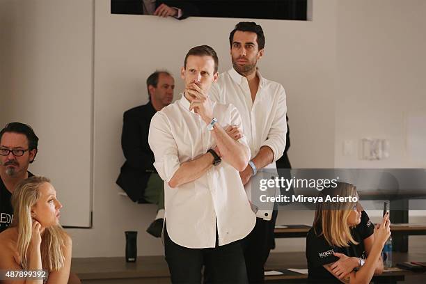 Fashion designer Dion Lee watches the rehearsal at the Dion Lee fashion show during Spring 2016 MADE Fashion Week at Milk Studios on September 12,...